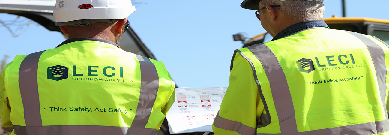 Ordinal Developments engineers reviewing construction drawings on site