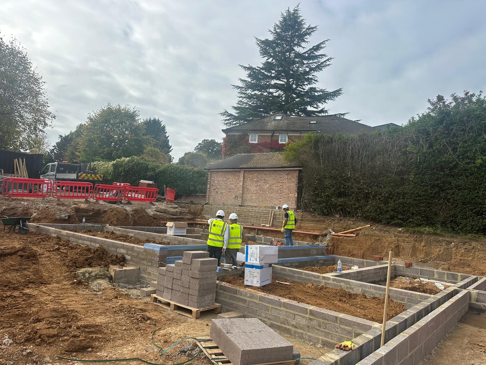 Ordinal Developments operatives setting out foundations on site